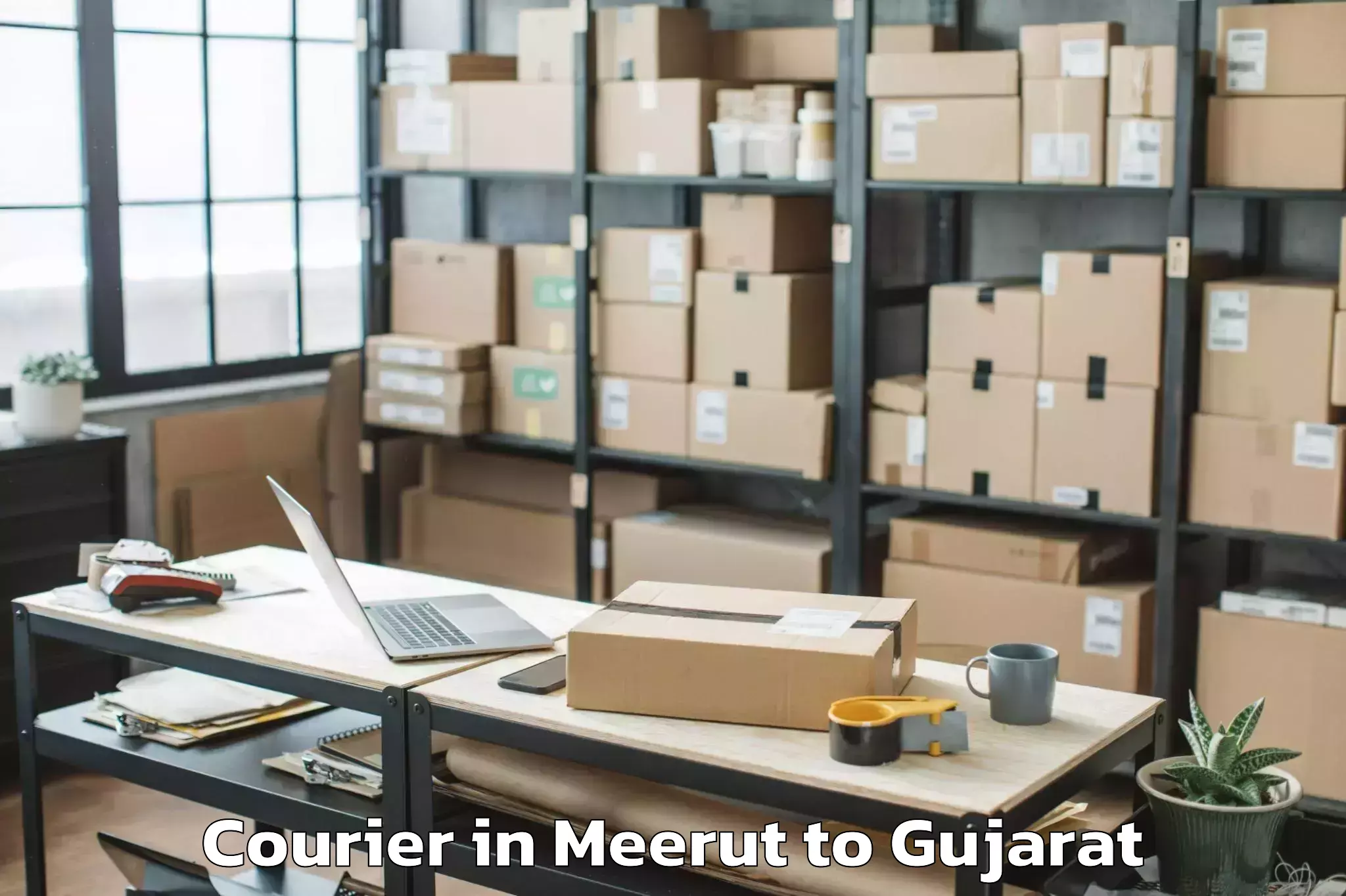 Reliable Meerut to Dhrol Courier